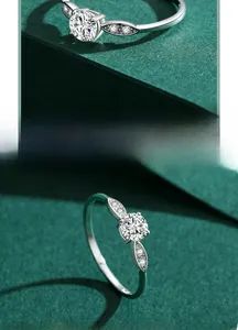 Macro shot of S925 sterling silver ring with leaf motifs and round zircon center stone