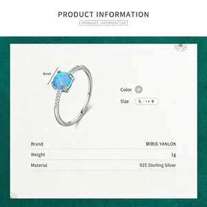 Bague élégante en argent sterling S925 avec opale bleue de 6mm et pierres latérales