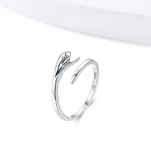 Adjustable S925 sterling silver mermaid tail ring with polished texture on white background