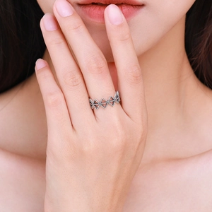 Vintage 925 sterling silver hollow geometric ring with zircon stones on model finger