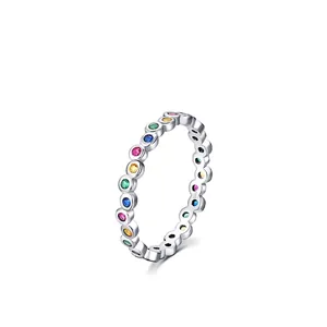 Minimalist S925 sterling silver eternity ring featuring rainbow gradient gemstones
