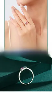 Macro shot of 925 silver ring featuring gradient rectangular tourmaline and open band