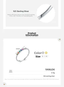 Detailed view of S925 sterling silver stamp and rainbow zircon inlay on dainty ring