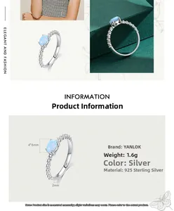 Detail view of 925 sterling silver ring with 4x6mm oval blue opal and beaded band style