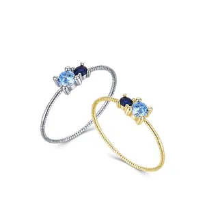 Braided S925 silver and 18K gold rings with two-tone blue zircon stones