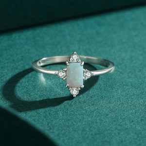 Elegant S925 sterling silver ring featuring a rectangular opal and starry zircon accents