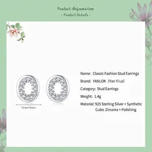 Polished 925 sterling silver oval stud earrings featuring sparkling cubic zirconia