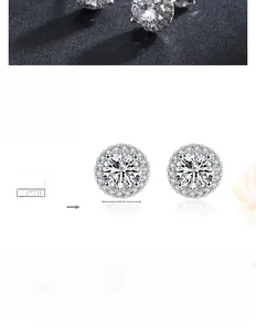 Detail of 925 sterling silver stud earrings with 5.5mm cubic zirconia in 6-prong setting