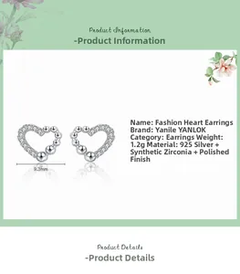 Detail of 925 sterling silver heart earrings featuring zircon inlays and beaded edges
