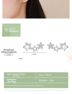 Detailed view of 925 sterling silver triple star stud earrings with cubic zirconia stones