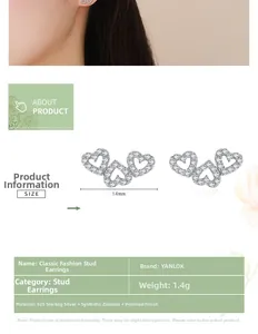 Détail des boucles d'oreilles en argent 925 avec triple cœur et zircons micro-paves