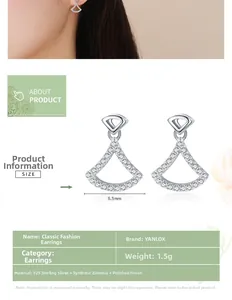 Détail macro de boucles d'oreilles éventail en argent 925 avec zircons et dimensions