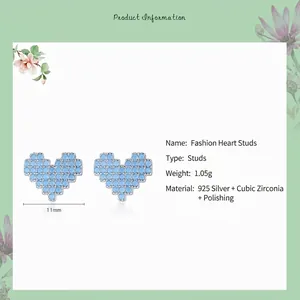 Minimalist 925 sterling silver heart stud earrings with turquoise cubic zirconia stones