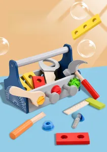 Macro detail of wooden toy toolbox with hammers, wrenches and screws for kids' DIY play