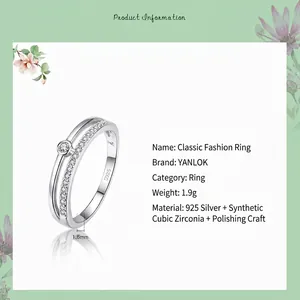 Classic S925 sterling silver layered ring with cubic zirconia on white floral background