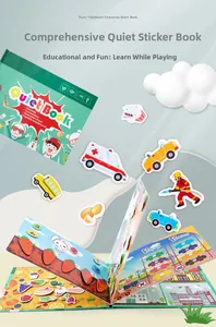 Detail view of educational quiet book with velcro stickers showing vehicles and fruits