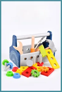 Detail of wooden tool box toy with wrench, hammer, screws and gears for kids' DIY fun