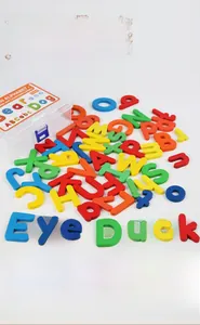 Detailed macro view of colorful wooden A-Z letters with a transparent storage box