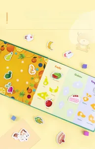 Educational Busy Book showing fruit and vegetable classification with reusable stickers