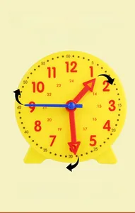 Detail view of the colorful clock face with moving hands for teaching children time
