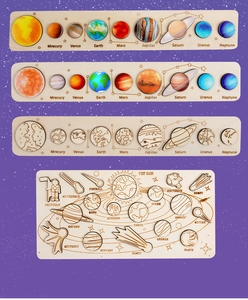 Detail of wooden solar system puzzle set with colorful planets and starry space background