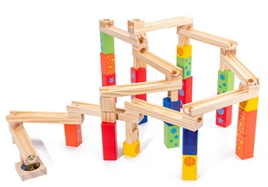 Detailed view of assembled wooden marble run with colorful patterned blocks and tracks