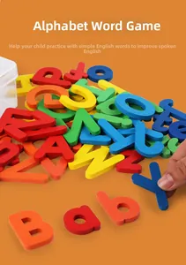 Close-up of hand spelling the word baby with colorful wooden alphabet letters for early learning