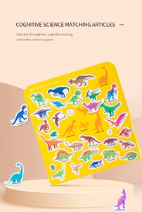 Detail view of dinosaur theme busy book with colorful matching stickers for toddlers