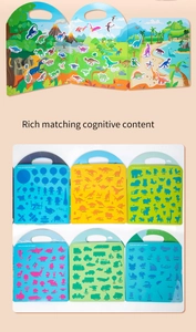 Macro detail of toddler busy book showing dinosaur scenes and shape matching cards for kids