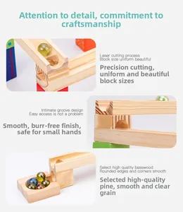 Macro shot of smooth polished pine wood tracks and colorful glass marbles for marble run