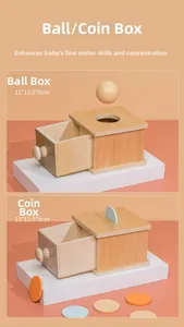 Detail view of Montessori wooden coin and ball box toy for early childhood development