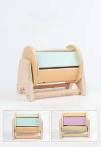 Macro view of Montessori spinning drum toy showing 18x12x15cm size and wooden texture