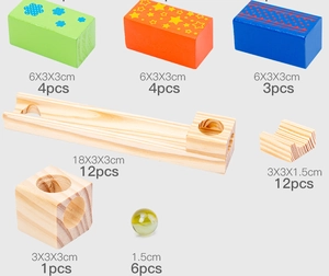 Detailed view of colorful wooden marble run blocks with diverse track sizes and dimensions