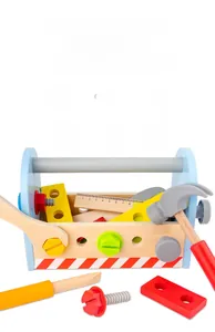 Macro view of wooden toy toolbox with colorful screws, gears, and simulation tools