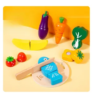 Macro detail of a 9-piece wooden play food set with a toy knife and round cutting board