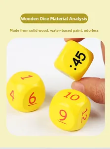 Detail of solid wood dice with time numbers and water-based paint for clock learning