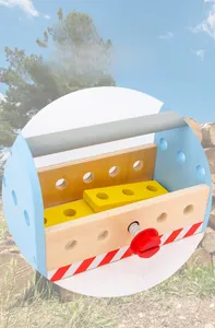 Detailed close-up of smooth polished edges and round holes on a wooden toy toolbox