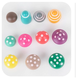 Educational wooden mushroom toy set with colorful stripes and dots for kids' early learning