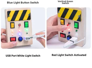 Detail showing hand operating a wooden busy board with switches and LED lights for kids