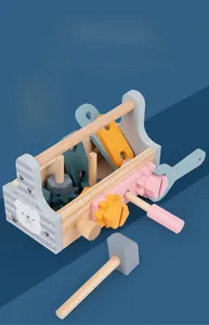 Detailed view of kids wooden tool box with colorful gears, nuts and screws for DIY play