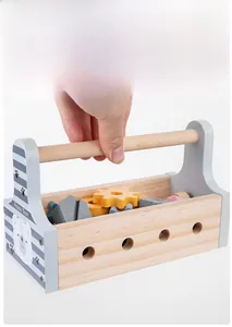 Portable wooden tool box toy showing the blue striped handle and bear print design