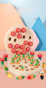 Top view of wooden mushroom and carrot memory chess game with colorful dice for kids