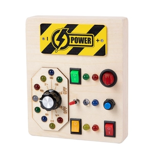 Wooden sensory busy board with colorful LED lights and power switches for early learning