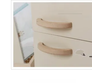 Detail of Nordic cream-colored wooden toy fridge with premium beech wood handle