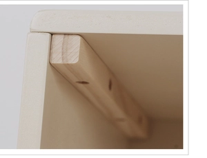 Detail of wooden corner reinforcement and pre-drilled holes in Nordic play fridge