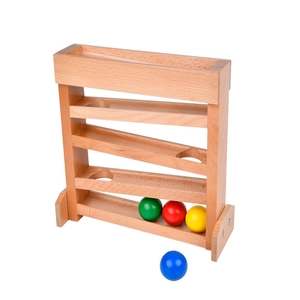 Montessori wooden ball tracker with four colorful sliding balls and tiered wooden ramp