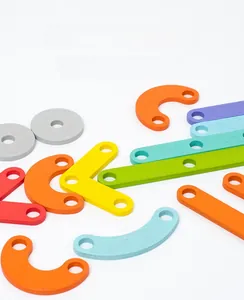 Detailed view of colorful wooden geometric blocks with holes for creative puzzle building