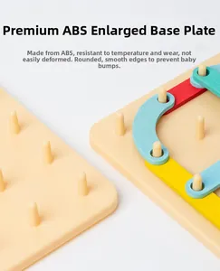Macro detail of safe ABS pegboard with rounded edges and colorful creative building parts