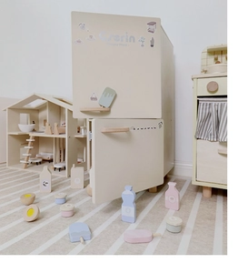 Detail of Nordic wooden play fridge and miniature food accessories for kids kitchen set