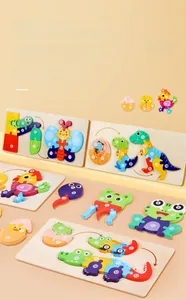 Detailed view of layered wooden puzzles showing the biological growth cycles of animals